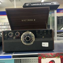 VICTROLA RECORD PLAYER.