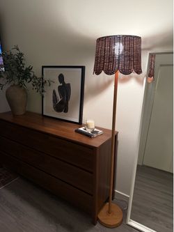 Rattan shade floor lamp