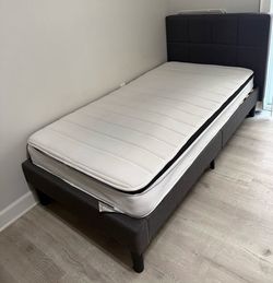 2 Twin XL Upholstered Bed Frames + Mattresses