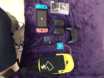 Switch -game(Crysis)(Crysis 2)(Pokemon Shield)(Pokemon Fire Red)-Split pad pro- Switch plugin dock- LED controller- Pikachu backpack-sd card 512