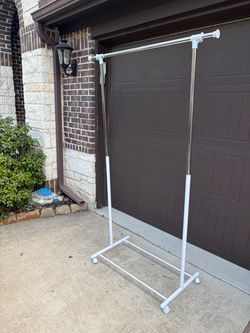 Rolling Clothes Rack with Chrome Bar