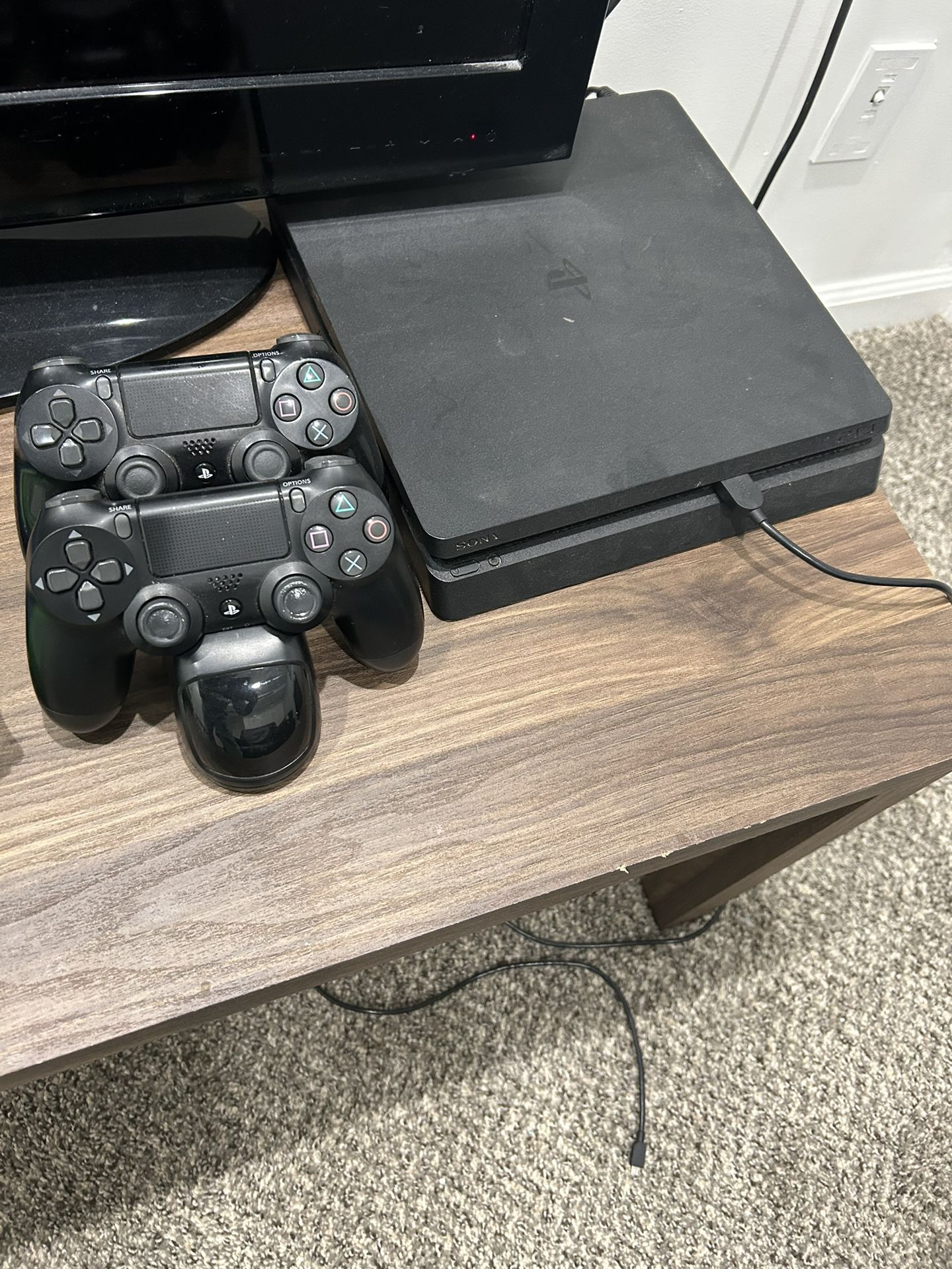 PlayStation 4 w/ Controllers, Wireless Charger & Games 