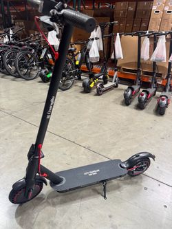 Electric scooter with shock absorption