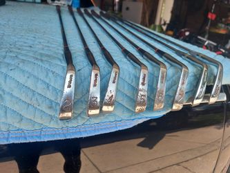 2 Sets Of Golf Clubs And Bag