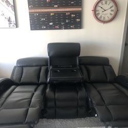 Black faux leather Power reclining sofa