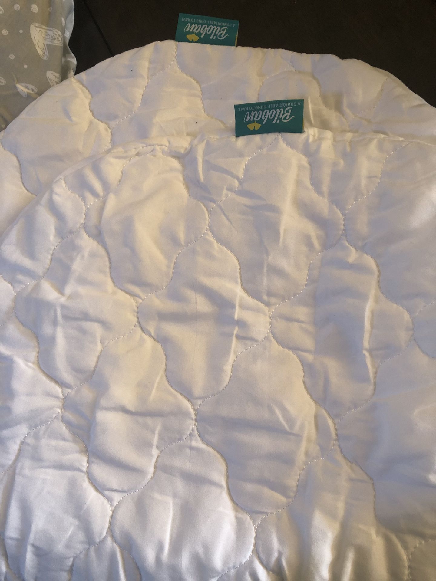 Halo Swivel Bassinet Mattress Pad And Sheets 
