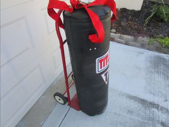 Boxing 70 lb heavy bag- NEW with wall mount hanger-NEW