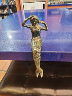 Mermaid shelf statue