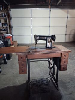 Old Singer Sewing Machine For Sale.