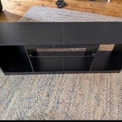 Bestier 57" tv stand carbon fiber look top