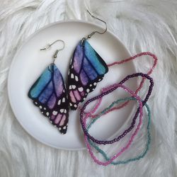 Colorful butterfly wing drop/dangle earrings and four beaded bracelets