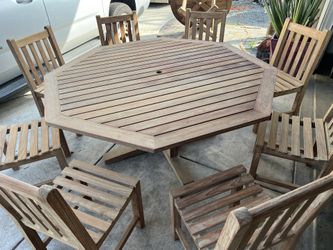 Mission teak brand outdoor teak octagon table with 8 teak chairs  Located in concord  Recently cleaned, sanded and teak oiled  Teak wood is heavy and 