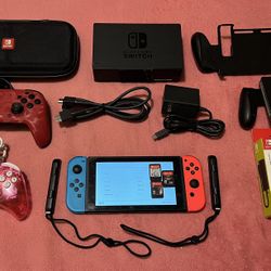 NINTENDO SWITCH IN PERFECT CONDITION LIKE NEW, SCREEN PROTECTOR, 3 GAMES, 3 CONTROLS, CASE AND MORE