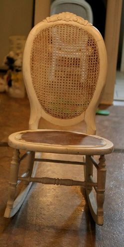 Vintage White Wood Rocking Chair with Cane Back.