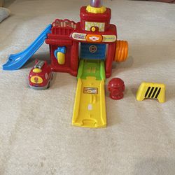 Toy Fire Station And Truck 