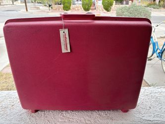 Samsonite pink luggage
