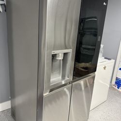 LG 27 cu. ft. Side-By-Side InstaView® Refrigerator