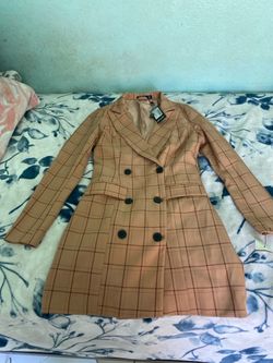 Brown coat still have tags on size 2 for women