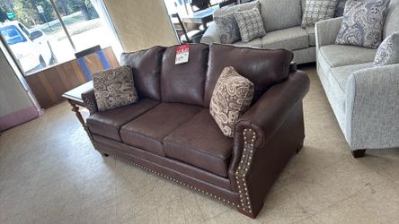 Brand new solid oak couch for only 1299