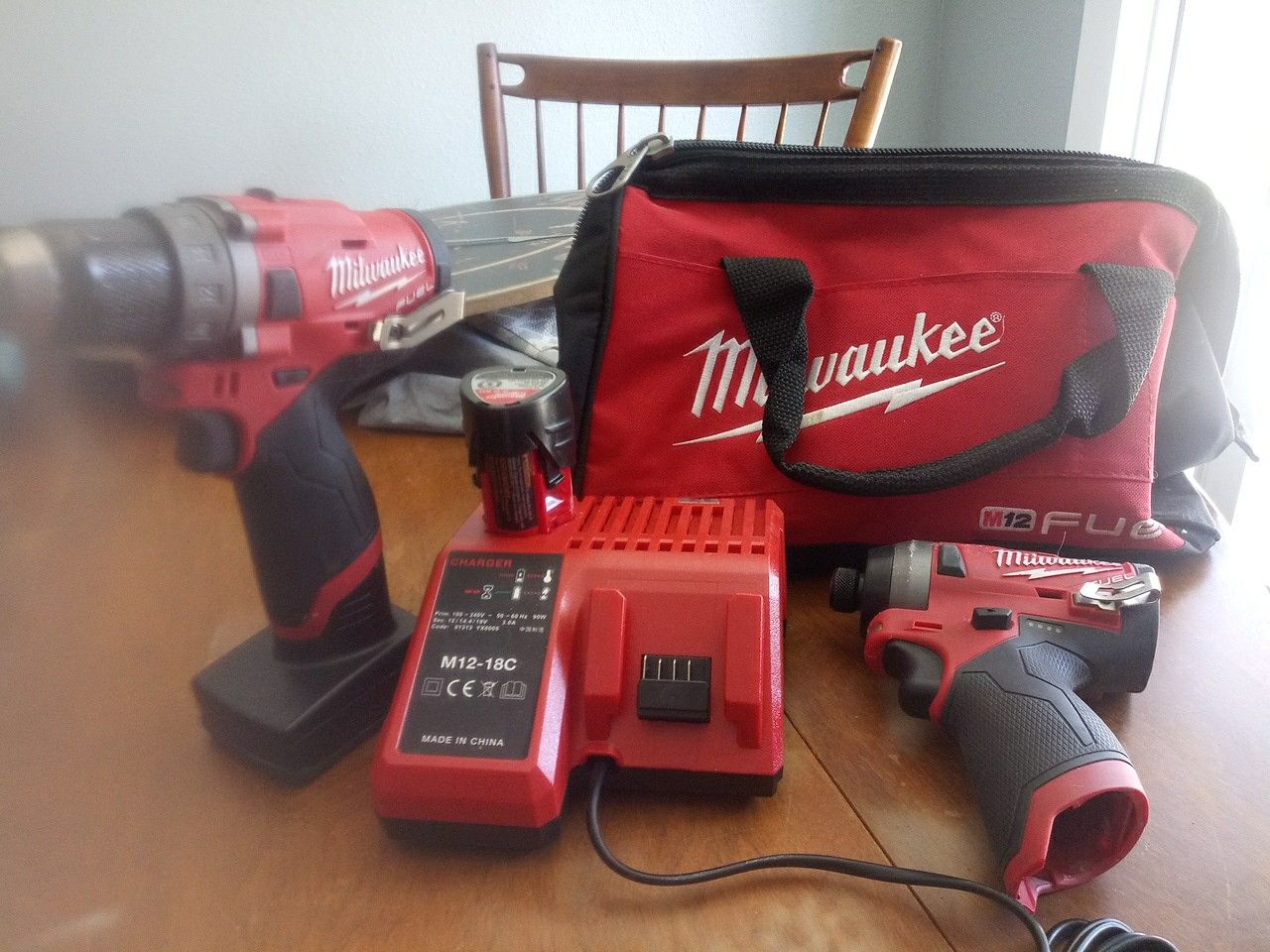 2 Milwalkee fuel impact drills 1 Milwaukee Hackzall with 1 tool bag