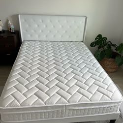 White bed frame with mattress