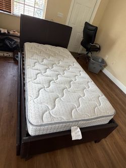 Twin storage bed with mattress
