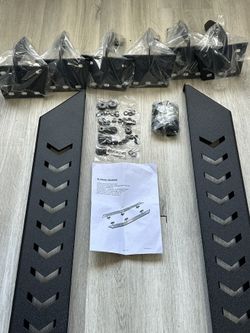 RUNNING BOARDS INSTALLATION INSTRUCTIONS For 2019-2025 Dodge Ram 1500 New Body Crew Cab Part Number:USVE8097-A ATTENTION: REMOVE CONTENTS FROM BOX. VE