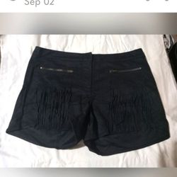 Black shorts with fringed pockets