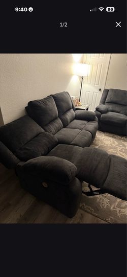 Electric reclining grey sofas