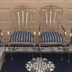 $100 Firm. 4 Wrought iron Chairs 