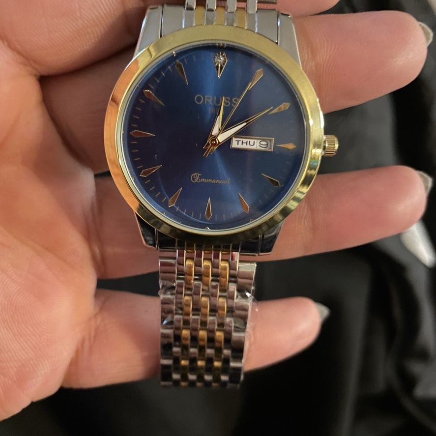 Men’s Blue, Silver, And Gold Watch