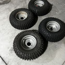 Carlisle 16x8-7 ATV wheels and tires