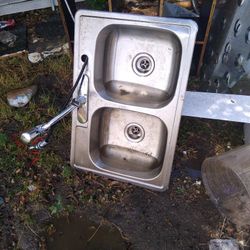 Stainless Steel Sink With Faucet.