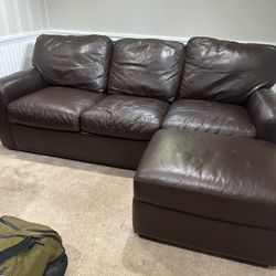 Pair of Brown Leather Couches With Pullout And Audiman 