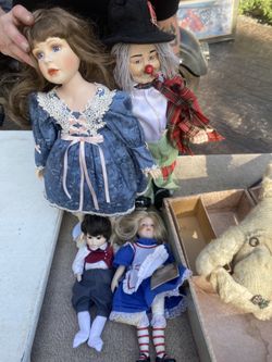 Vintage clown and Alice dolls 