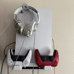 PS5 Slim with two controllers and headset includes PlayStation mount