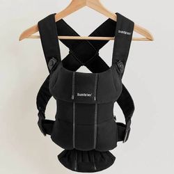 BabyBjörn Baby Carrier Mini in black.