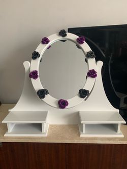 White oval vanity mirror with glitter roses