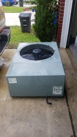 Rudd , 3.5 ton condenser , w /refrigerant . Used unit