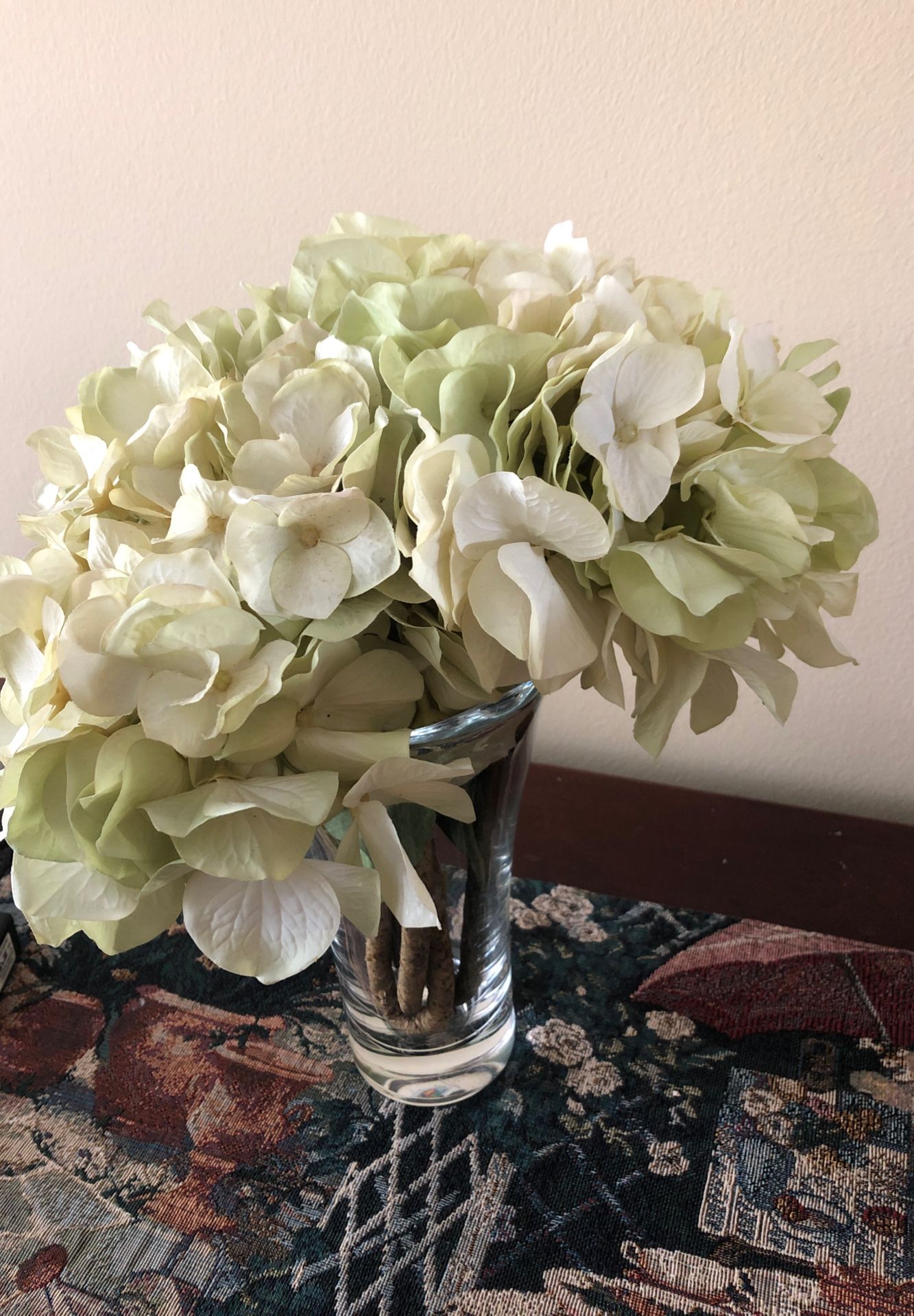 Glass vase with silk flowers