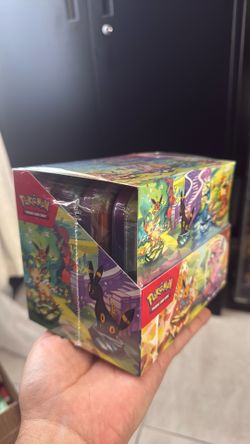 Pokemon prismatic evolutions tin display (8 tins) sealed
