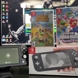 Grey Nintendo switch Light with Games and Original Box