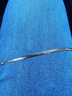 14k gold broken chain piece . 2.3 grams