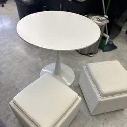 Circle Table And Two Ottomans 