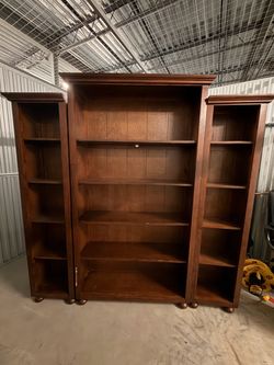 Three piece wood mix book shelves