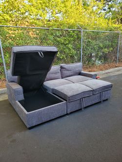 Gray Sectional Sofa With Storage Chaise And Pullout Bed