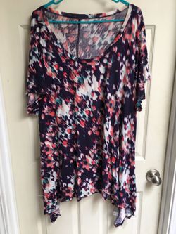 Woman’s 3x shark bite top