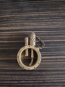 Vintage steampunk refillable fluid lighter