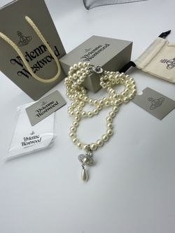 Brand new Vivienne Westwood Three Row Pearl Bas Relief Choker in Silver