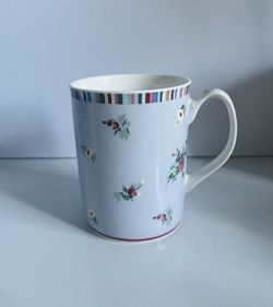 Laura Ashley Mug 12 Oz. Very Light Lilac Color  With Little Flowers All Around including the handle. Comes from a smoke free environment.  